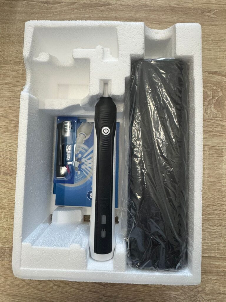Электрическая зубная щетка Braun Oral-B PRO 750 D16.513.1UX Cross Action Black Edition (Черный) +Travel Case 6