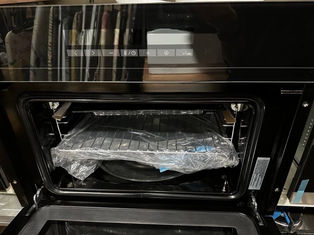 Компактный духовой шкаф с СВЧ Haier HMX-BDC399B