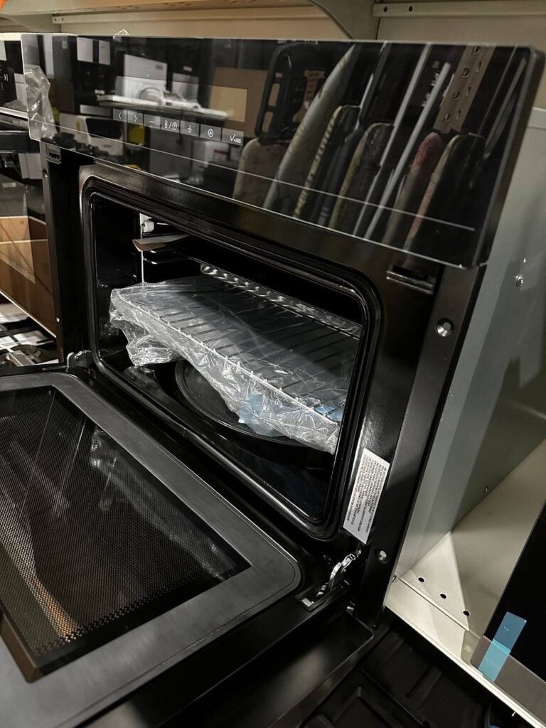 Компактный духовой шкаф с СВЧ Haier HMX-BDC399B