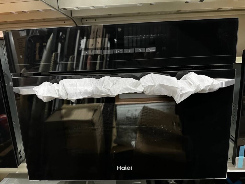 Компактный духовой шкаф с СВЧ Haier HMX-BDC399B