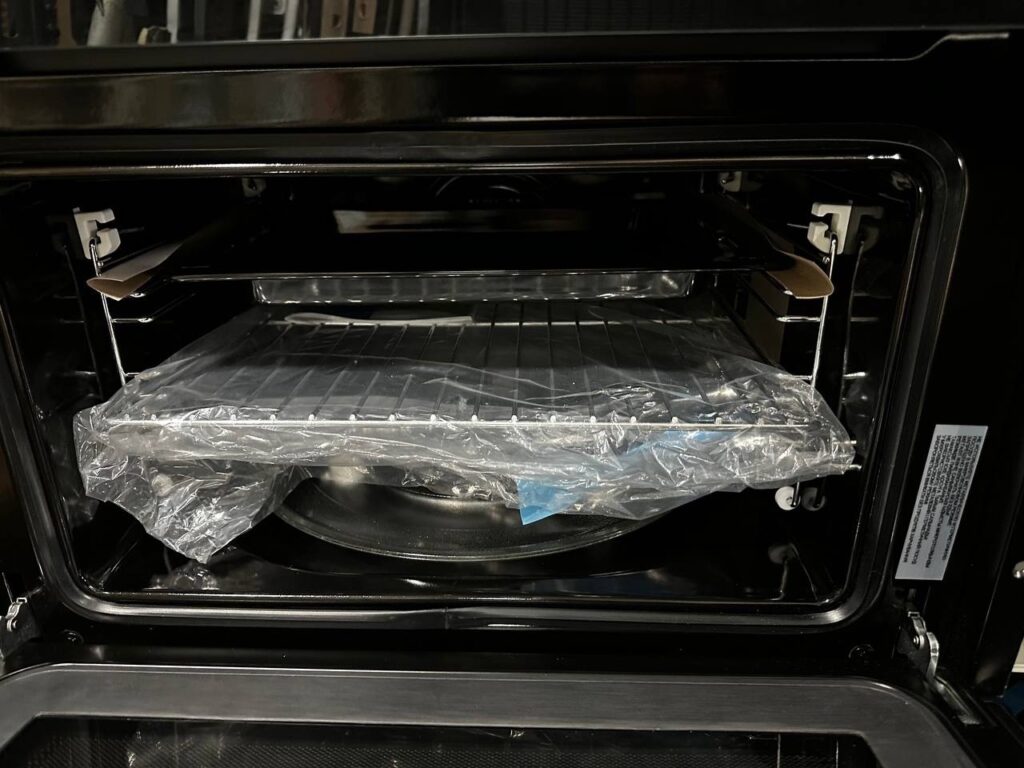 Компактный духовой шкаф с СВЧ Haier HMX-BDC399B